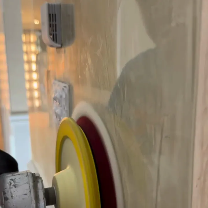 Venetian plaster feature wall being polished